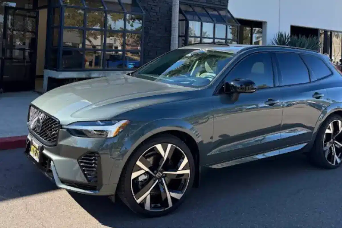 Side view of a gray SUV showcasing its sleek design and large wheels.