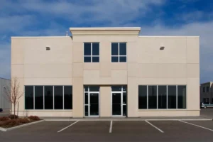 Large commercial building featuring professionally tinted windows for energy efficiency and privacy.