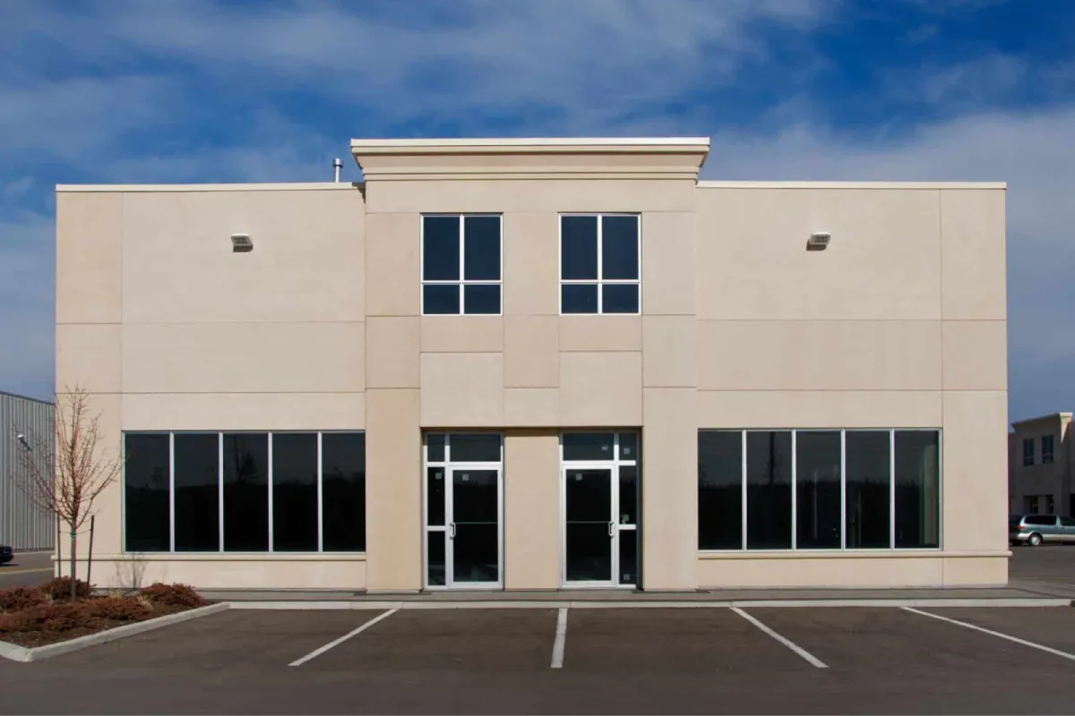 Large commercial building featuring professionally tinted windows for energy efficiency and privacy.